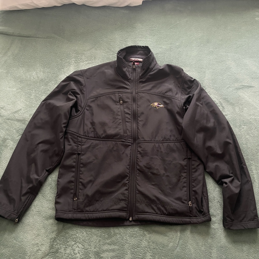 Despite looking puffy this actually a Lightweight Ravens Jacket.